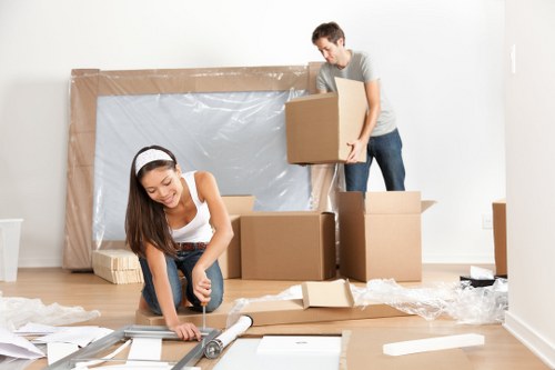 Careful loading of household items for a move near Belgravia