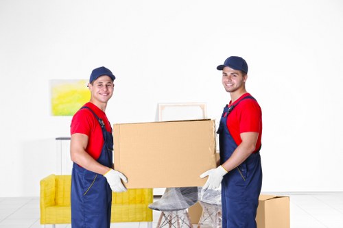 Man with van loading furniture for a UK move
