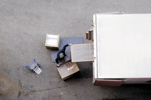 Careful unpacking and room setup in a central London property