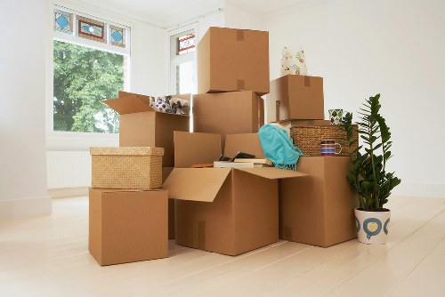 Packing and loading boxes into a moving truck in Belgravia