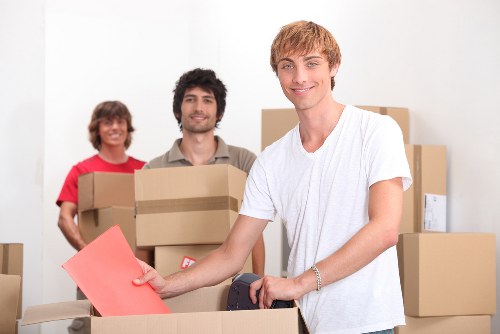 Belgravia moving service loading boxes and household items