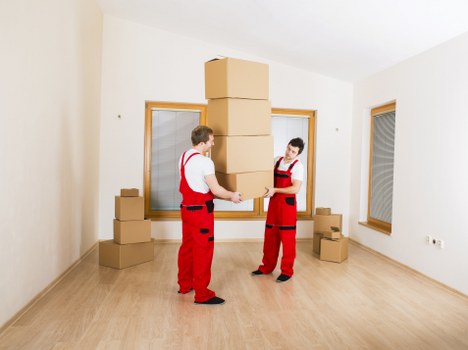 Packed boxes and furniture ready for a home move in Belgravia